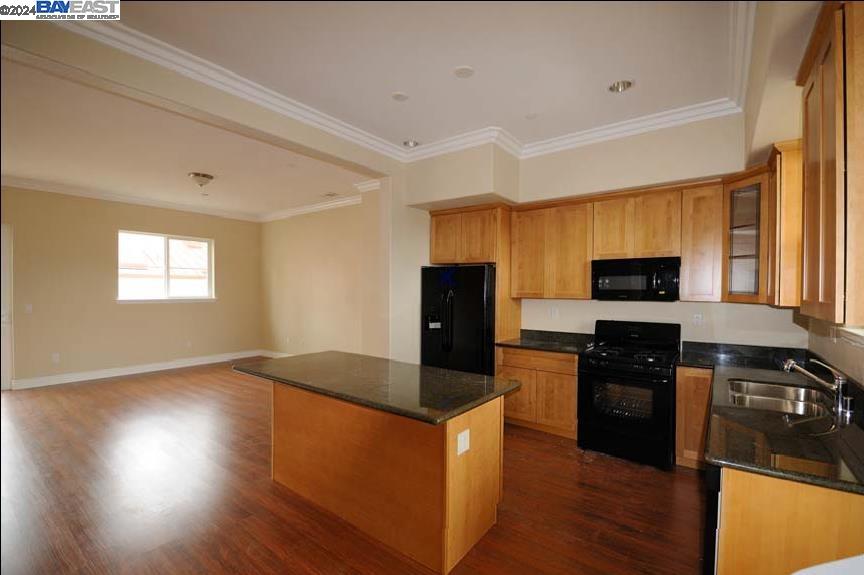 3101 Starburst Court San Jose, CA 95127 - Photo 4 of 15 a kitchen with granite countertop a refrigerator stove top oven and sink