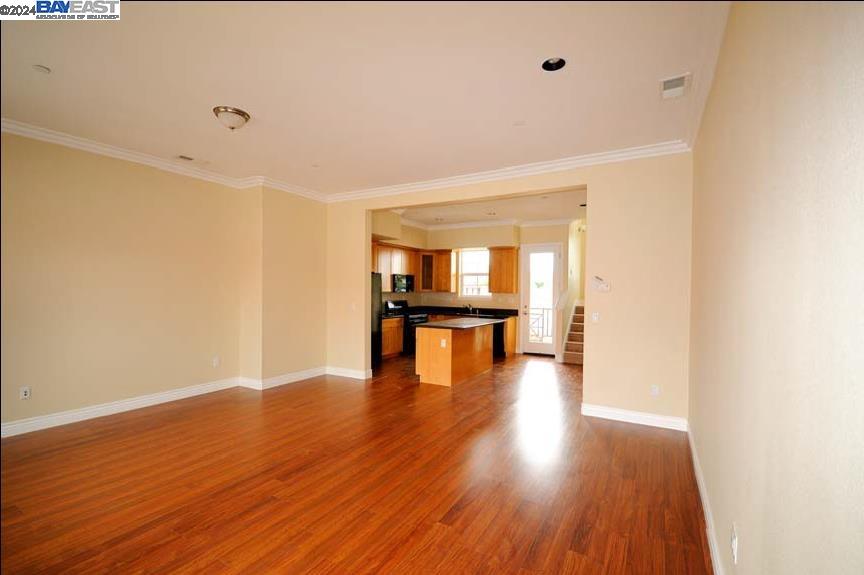 3101 Starburst Court San Jose, CA 95127 - Photo 5 of 15 a view of an empty room with wooden floor
