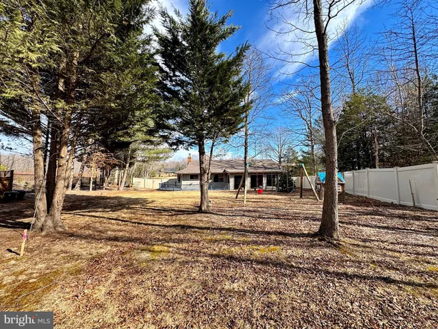 a view of an empty room with a balcony