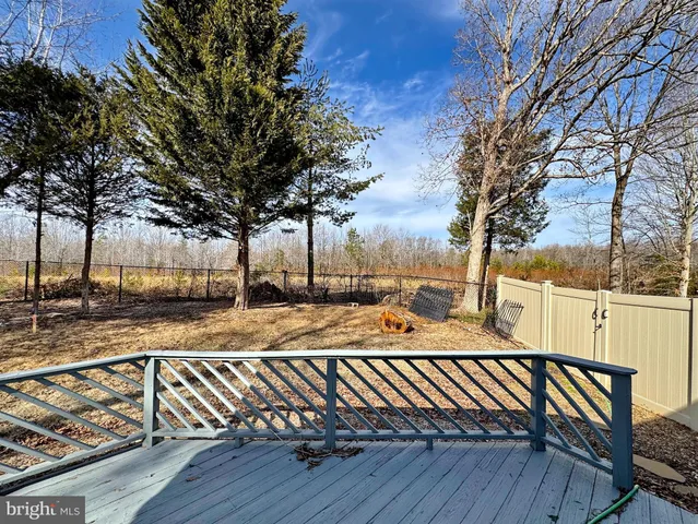 a view of a bathroom with brick walls