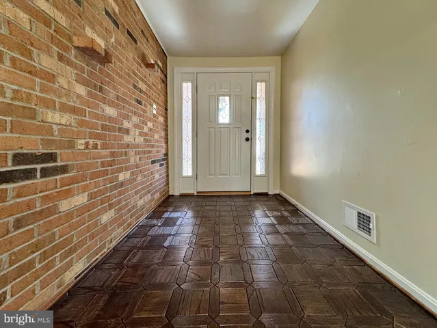 a kitchen with a sink and a window