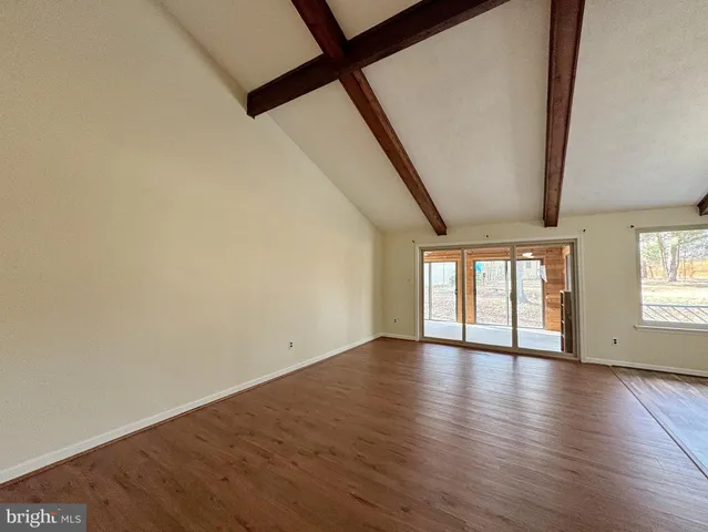 a kitchen with appliances and cabinets