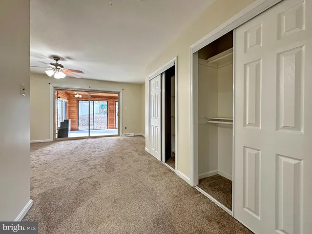 a bathroom with a toilet a sink and bathtub
