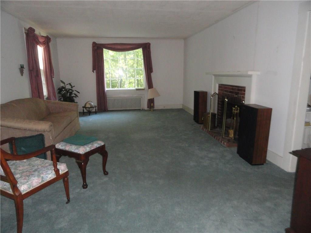 880 Valley Road Waterford, ME 04088 - Photo 16 of 27 Living room with wood fireplace