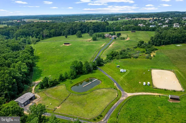 a view of a house with a big yard