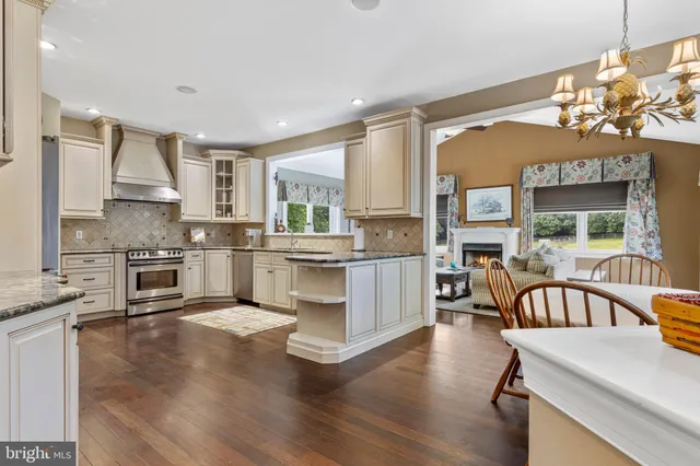 a spacious bedroom with a bed and a flat screen tv