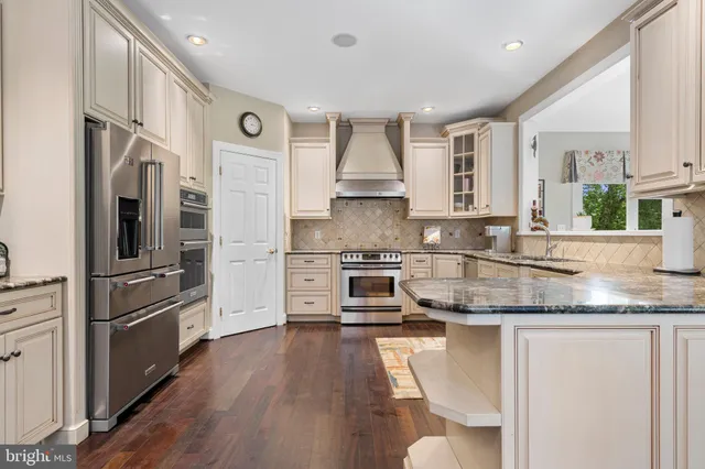 a view of living room with furniture and window