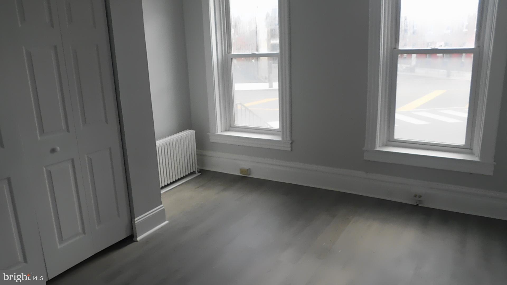 247 East 3rd Street Lewistown, PA 17044 - Photo 6 of 24 a view of an empty room with a window
