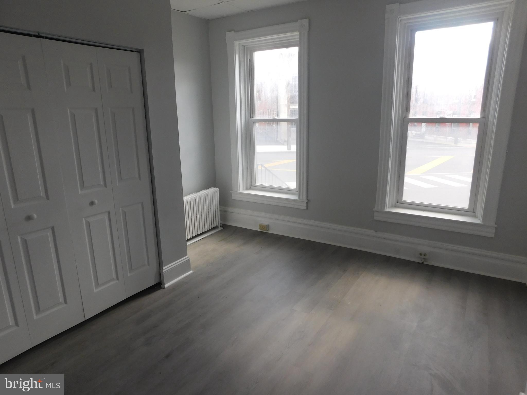 247 East 3rd Street Lewistown, PA 17044 - Photo 7 of 24 a view of a livingroom with wooden floor and a window