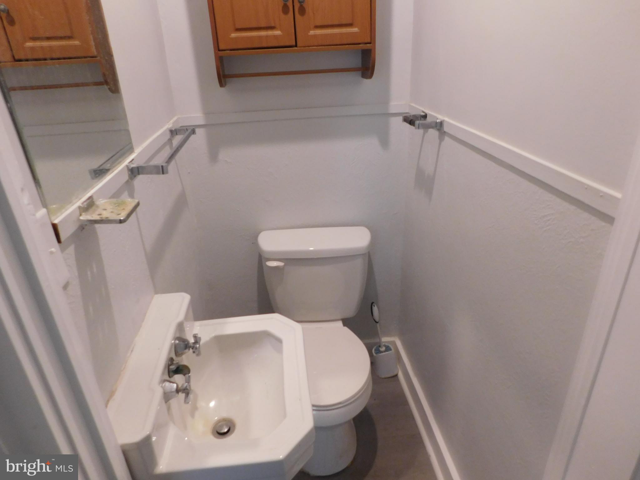 247 East 3rd Street Lewistown, PA 17044 - Photo 8 of 24 a white toilet sitting next to a white sink