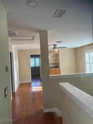 a view of livingroom and hardwood