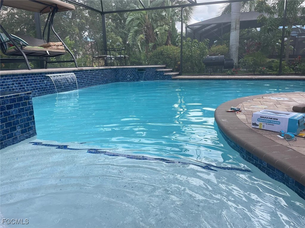 12398 Rock Ridge Lane Fort Myers, FL 33913 - Photo 34 of 43 a view of a backyard with sitting area