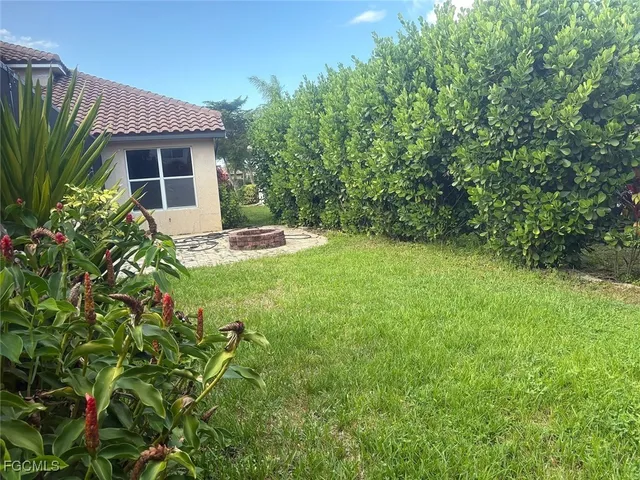 a house view with a garden space