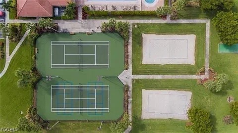 12398 Rock Ridge Lane Fort Myers, FL 33913 - Photo 43 of 43 a green field in front of the house