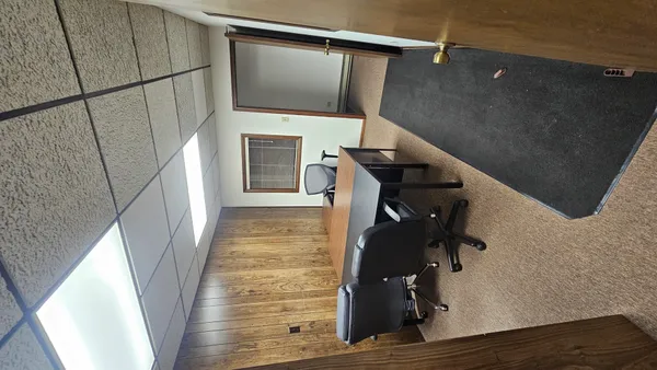 a view of entryway with wooden floor