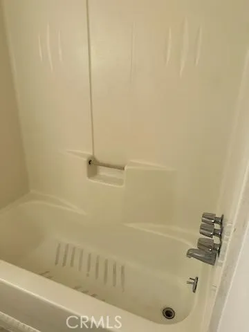 a bathroom with a toilet and a sink