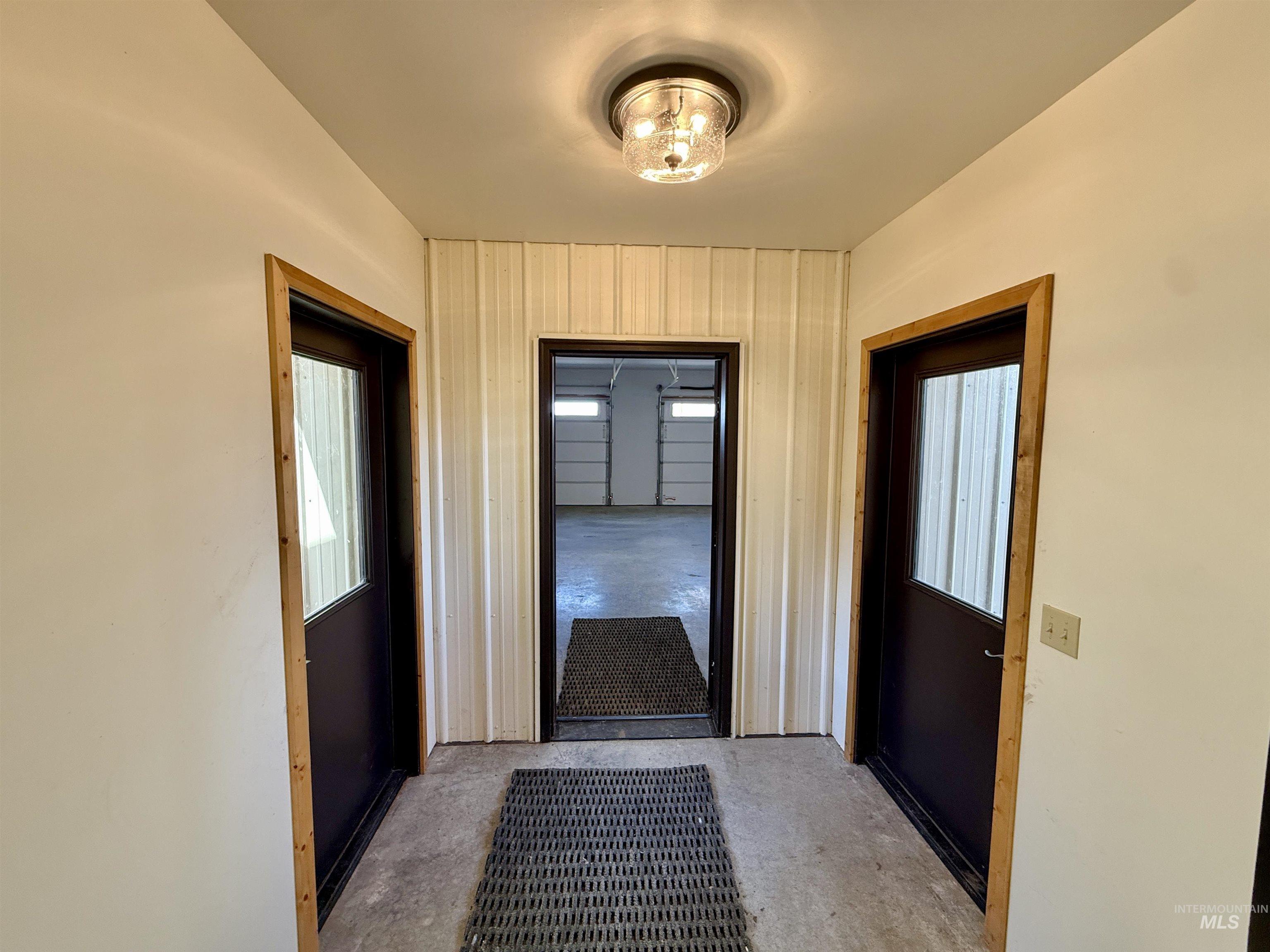 150 Buck Boulevard White Bird, ID 83554 - Photo 26 of 45 Hallway featuring unfinished concrete floors