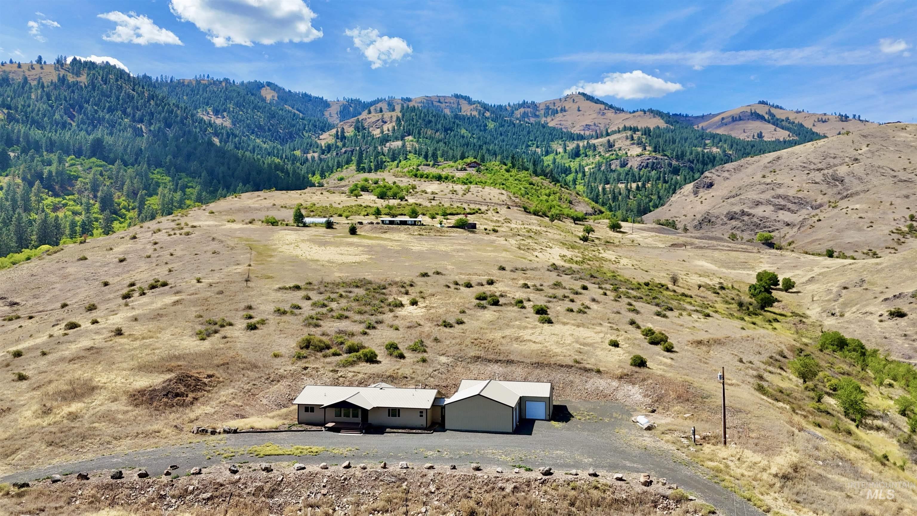 150 Buck Boulevard White Bird, ID 83554 - Photo 43 of 45 Mountain view with rural landscape