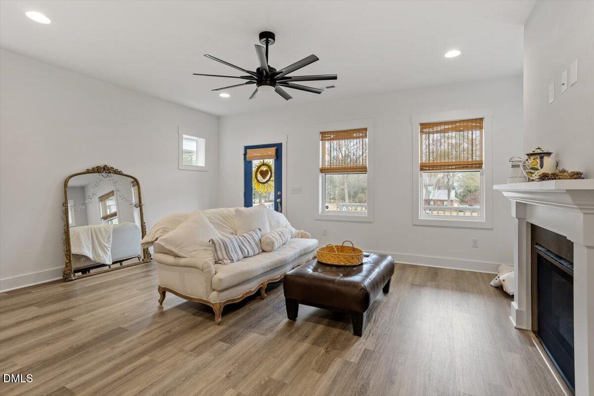 6411 Taylor Road Wendell, NC 27591 - Photo 8 of 38 living room and fireplace