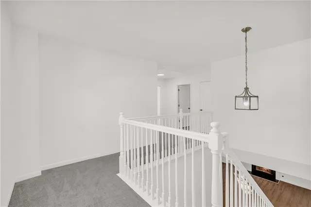 a view of room with a ceiling fan