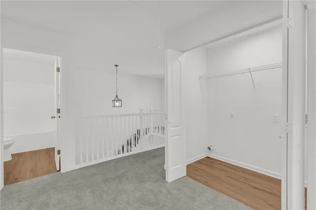 a view of a room with racks on the wall