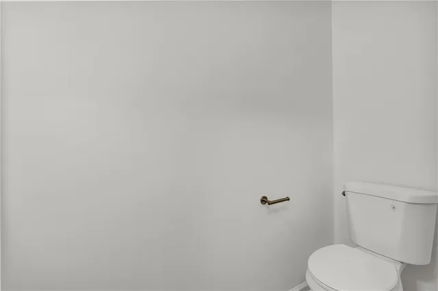 a kitchen that has a sink and a stove in it