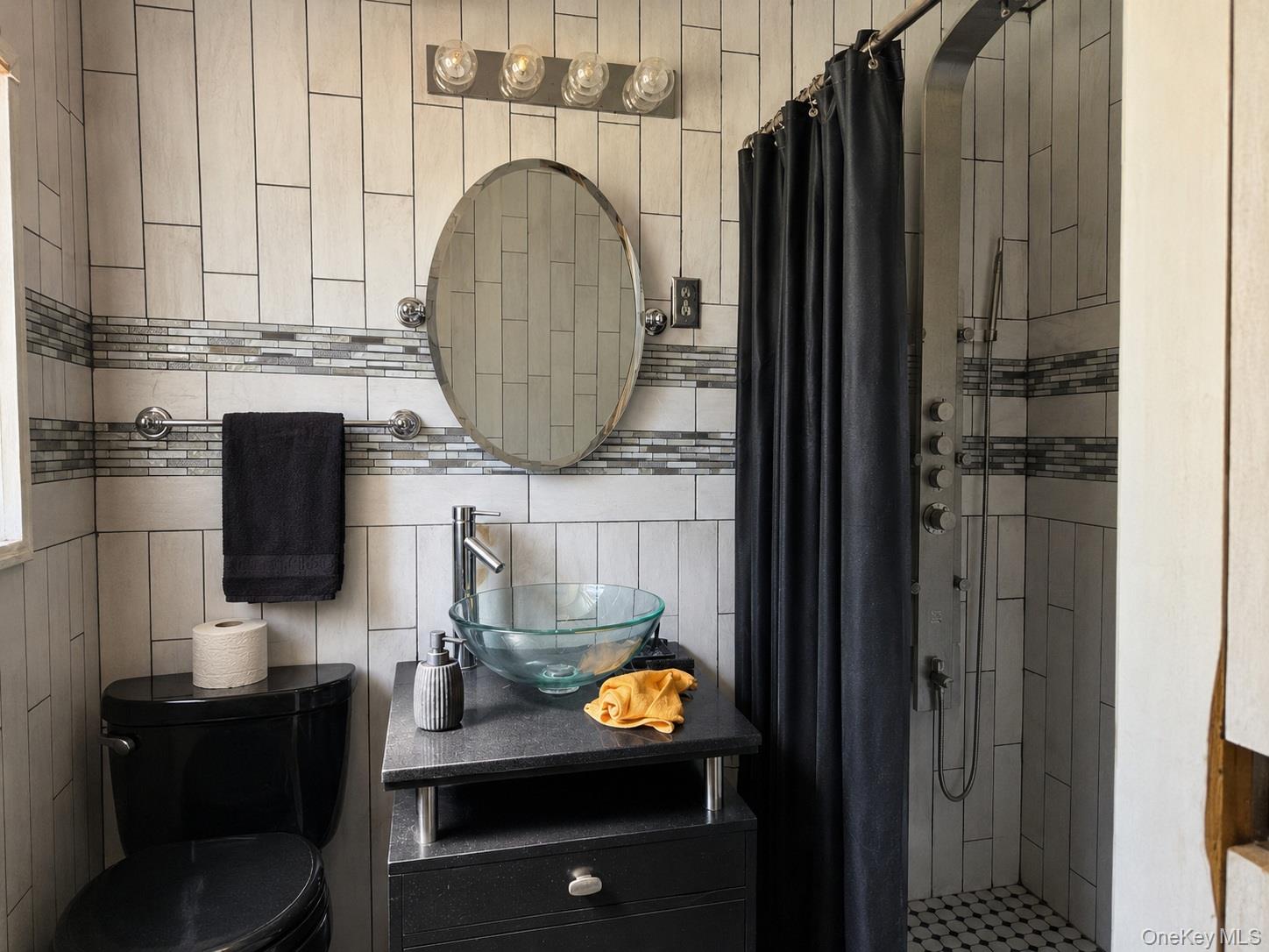 125 Zimmerman Road Loch Sheldrake, NY 12759 - Photo 15 of 43 a bathroom with a sink and a mirror