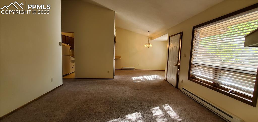 401 Forest Edge Road, Unit A8 Woodland Park, CO 80863 - Photo 5 of 17 a view of empty room with stairs