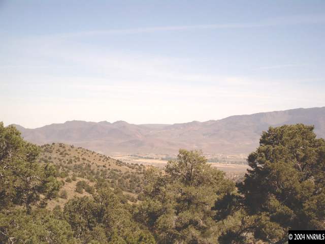 255 South Virginia Street Reno, NV 89501 - Photo 1 of 4 a view of a mountain range in a cloudy sky