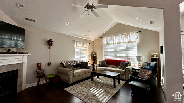 929 West 1920 South, Unit A Syracuse, UT 84075 - Photo 7 of 26 Living room with ceiling fan, a fireplace, lofted ceiling, and dark hardwood / wood-style floors