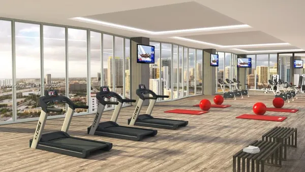 a view of a room with gym equipment