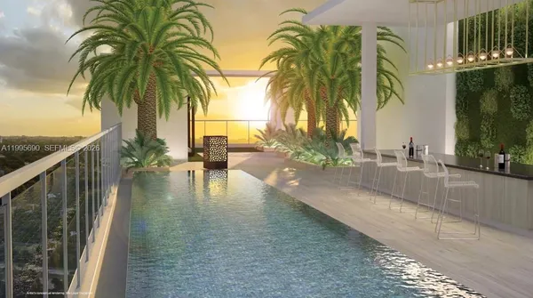 a view of swimming pool with a table and chairs