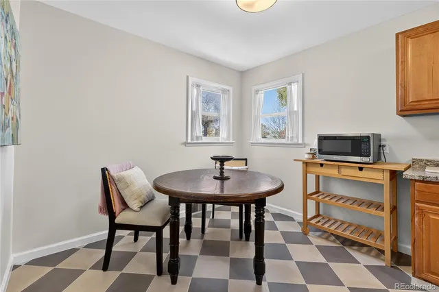 a view of a livingroom with furniture and wooden floor