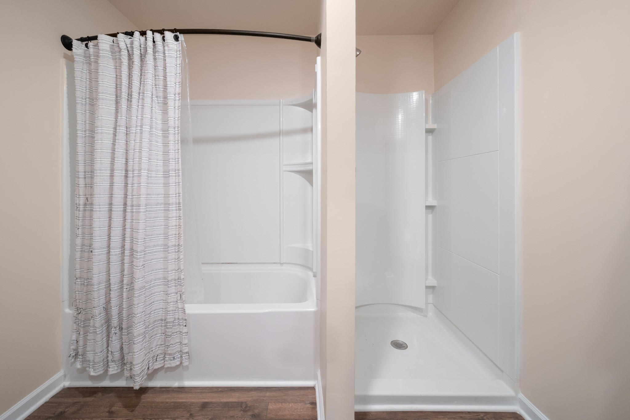 307 Masters Way Dickson, TN 37055 - Photo 16 of 26 a bathroom with a bathtub and a shower