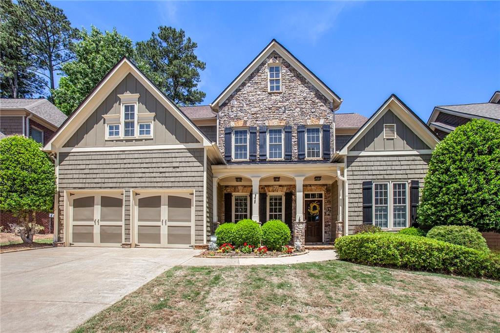 4129 Barnes Meadow Road Southwest Smyrna, GA 30082 - Photo 1 of 1 front view of a house with a yard