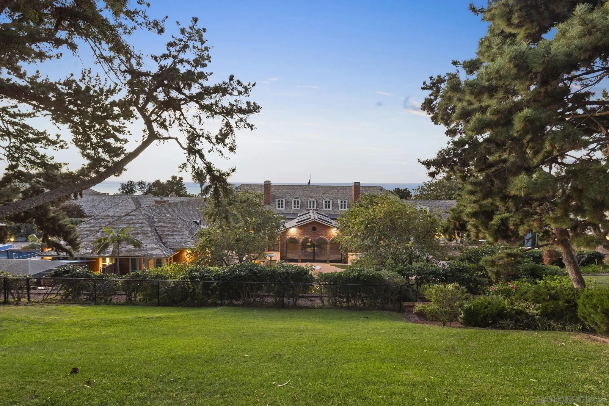 7007 Country Club Drive La Jolla, CA 92037 - Photo 4 of 9 a aerial view of a house with a yard