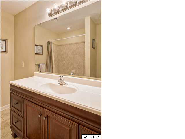 1711 Old Forge Road Charlottesville, VA 22901 - Photo 12 of 18 a bathroom with a sink and a mirror