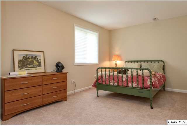 1711 Old Forge Road Charlottesville, VA 22901 - Photo 14 of 18 a bedroom with a bed and window