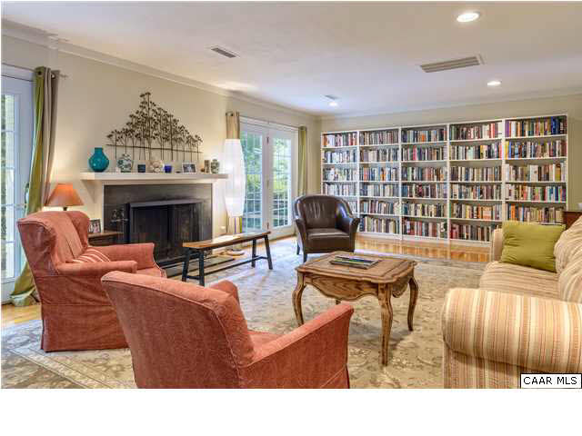 1711 Old Forge Road Charlottesville, VA 22901 - Photo 3 of 18 a living room with furniture a fireplace and a large window