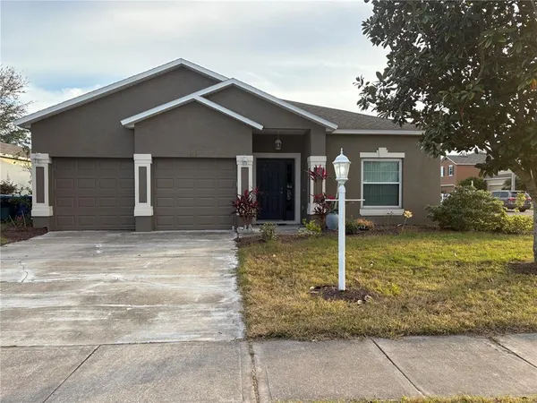 a front view of house with yard