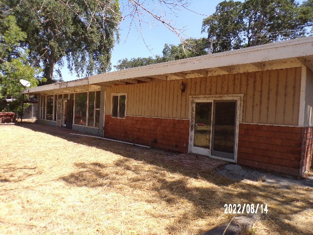 13425 Jensen Road Clearlake Oaks, CA 95423 - Photo 4 of 17 a view of a house with a yard covered in snow