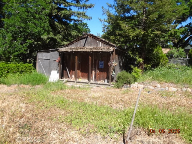 13425 Jensen Road Clearlake Oaks, CA 95423 - Photo 6 of 17 a front view of a house with garden