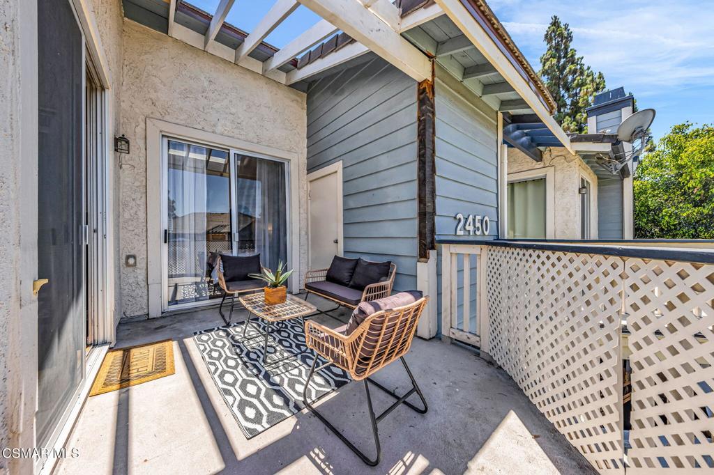 2450 Pleasant Way, Unit N Thousand Oaks, CA 91362 - Photo 32 of 39 a backyard of a house with outdoor seating