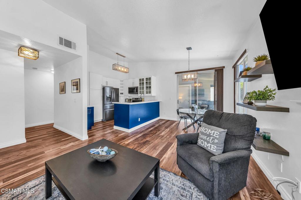 2450 Pleasant Way, Unit N Thousand Oaks, CA 91362 - Photo 5 of 39 a living room with furniture and wooden floor