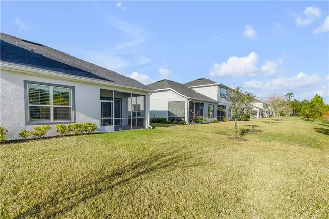 a view of a lake with a yard