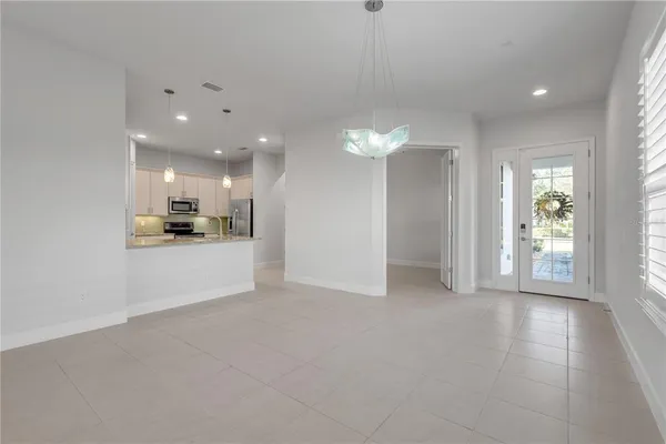 a view of a kitchen and a window
