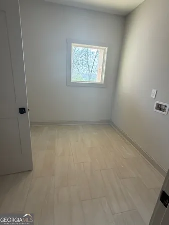 an empty room with windows