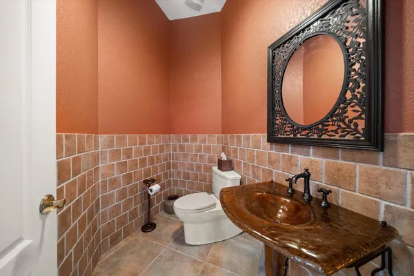 a dining room with furniture window and wooden floor