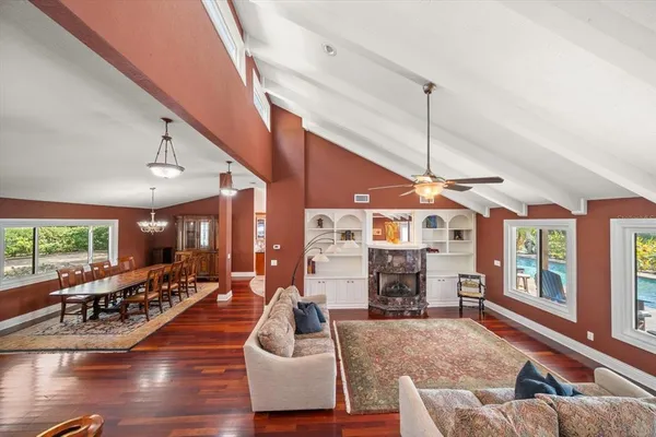 a bathroom with a toilet a sink and a mirror