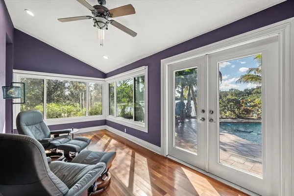 a view of a balcony with wooden fence
